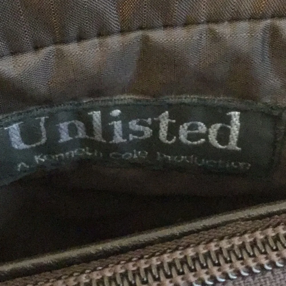 ‘Unlisted by Kenneth Cole’ Messenger Bag